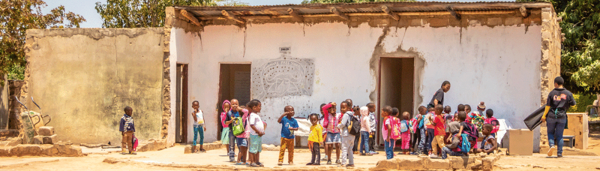 A group of school children and teachers at the Santa Shoebox project